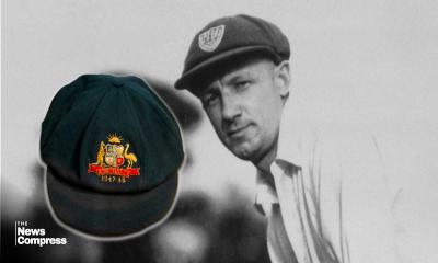 Bradman’s ‘baggy green cap’ sells for record £232,000 at auction